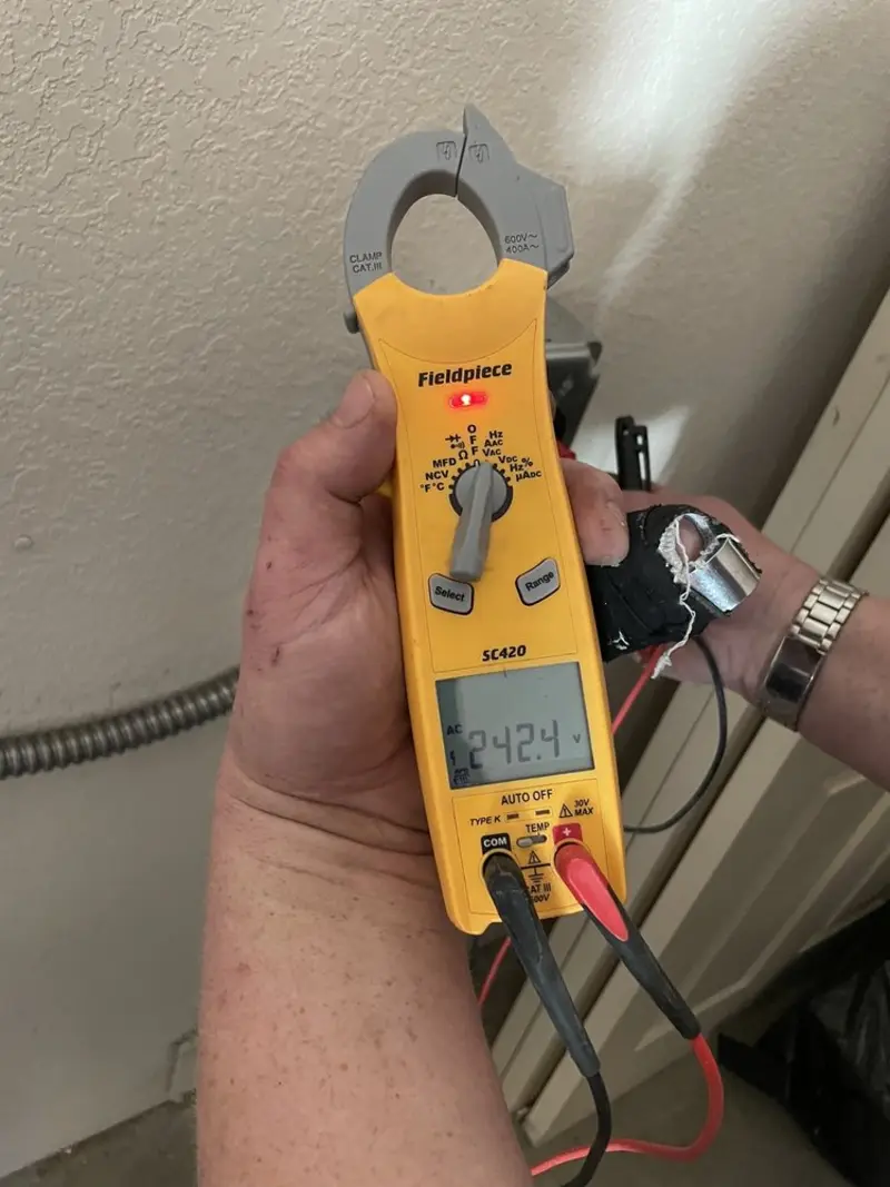 Voltage testing with clamp meter during Ceiling Fan Installation in Union Springs